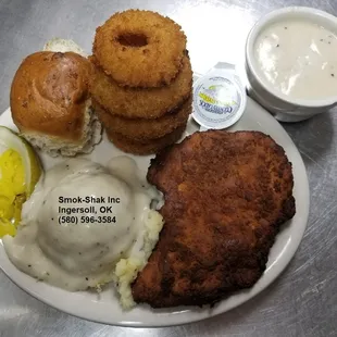 Smok-Shak&apos;s Fried Chicken Breast - served with a homemade dinner roll, homemade cobbler, and two regular sides. Ask for extra side of gravy.