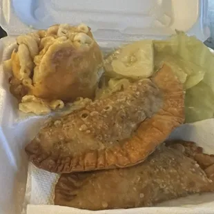 Mac n cheese, cabbage and Jamaican beef Pattie's courtesy of IslandboyKreations!