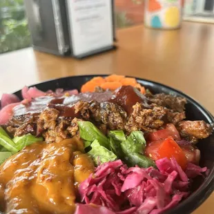 Brisket salad bowl half rice half lettuce