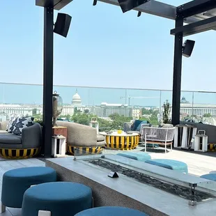 the view of the ocean from a rooftop bar