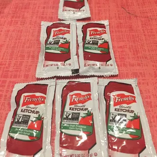 five packets of ketchup