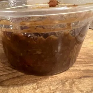 Smokehouse chili that I received on my UberEats order Friday evening. Barely 50% filled. Absolute scam.