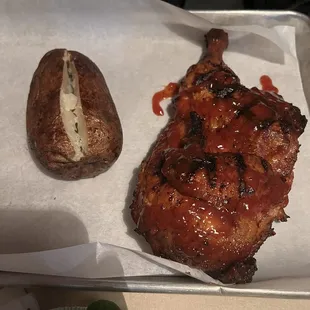 a baked potato and chicken