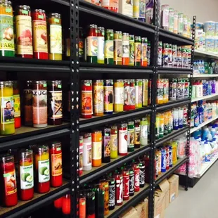 Candles and general household items near the back (eg. Window cleaner, dish soap, paper towels, etc)