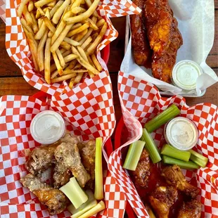 Basket of fries, honey siracha tenders, garlic parmesan wings &amp; thai zing wings