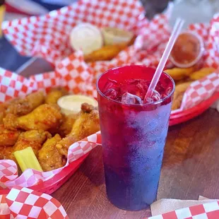 a red and white checkered basket of food