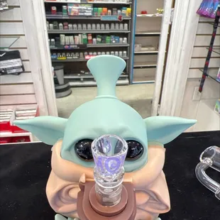 Came here looking for unusual and purple and Dretti hooked me up with  Baby Yoda with the purple accented bowl...this is the spot