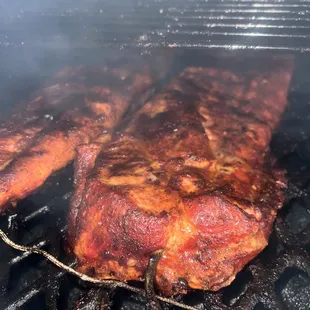 meat cooking on a grill