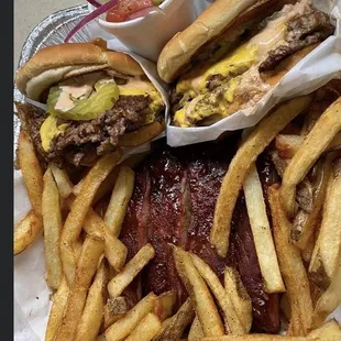 Smash burgers and ribs with fries