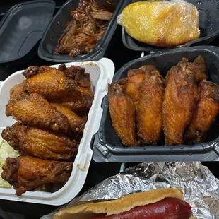Old bay wings, hot wings, brisket, dog and cornbread