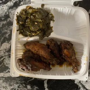 a styrofoam container of food