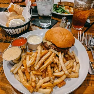 a plate of fries and a burger