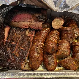 a variety of meats and sausages