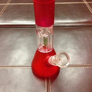 Mini glass on glass bong with a perc and ice catcher. Compact and does the job super effectively!