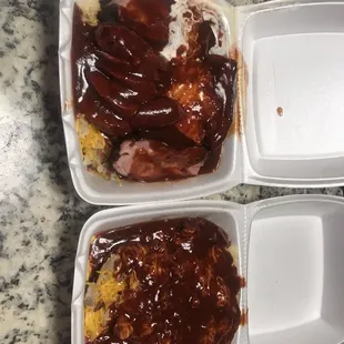 2 baked potatoes covered in bbq sauce, it's tastes worst than it looks,,, through both in trash