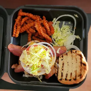 Close up of my bacon cheese burger with sweet potato fries