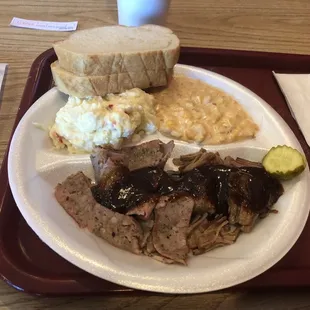 Lunch plate. Sausage, burnt ends, corn and potato salad