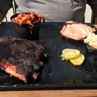 Smokecraft combo (pick 2) - St. Louis ribs and duroc pork, with baked beans and the cole slaw I didn't want