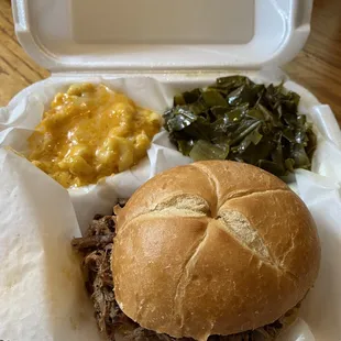 Pulled pork sandwich, Mac and cheese, collard greens