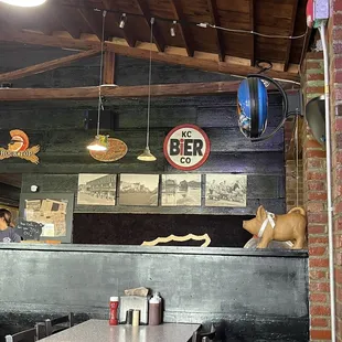 Signs and decor by the door when you walk in.