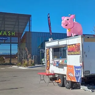 Trailer parked at the Gleam II Car Wash off Colfax