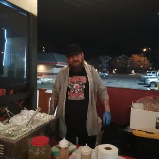 Ryan stopped for a quick pose between serving orders!