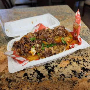 Been a minute since I had the oxtail poutine!