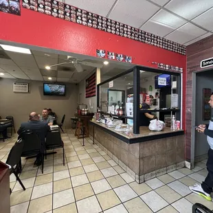 Order at the counter. 7 tables inside, more outside.