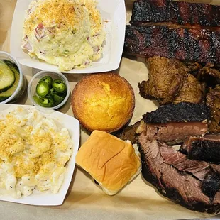 Combo 4 Plate ($26) with Tri Tip, brisket, and ribs (+$3), potato salad, Mac and cheese, + garlic cornbread ($1.50)