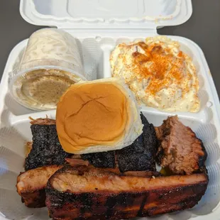Combo 2 (should have been combo one with one side as ordered): beef brisket, pork ribs, Mac and cheese, potato salad, and dinner roll.