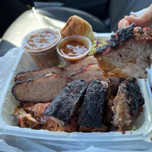 Combo 6 with double brisket + chicken. Beans, and coleslaw sides. Moist &amp; tender!