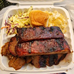 Pork ribs, tri tip (left), brisket (right), coleslaw, roll, Mac and cheese