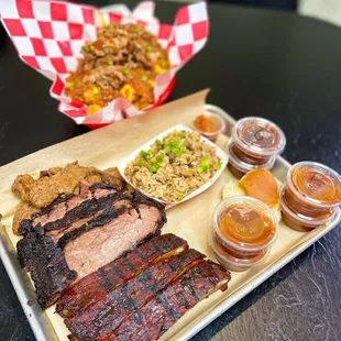 tri-tip, brisket, pork ribs with dirty rice