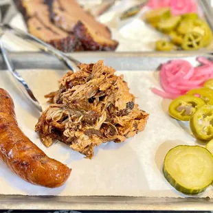 (left) Jalapeño Cheddar Sausage (right) 1/2 lb. Pulled Pork