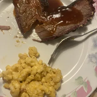 Brisket with bbq sauce and mac and cheese