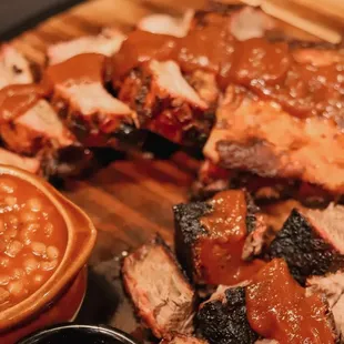 Pork spare ribs, 1/4 bone-in chicken &amp; one sliced meat, with three large sides, Texas toast and pickles.