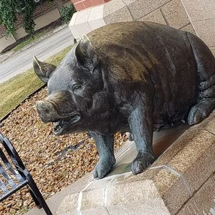 a bronze statue of a bear
