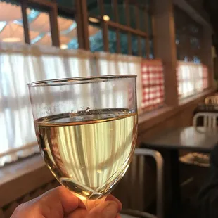 Relaxing with a glass of Chardonnay. (Kendall Jackson $11.85)