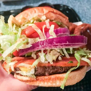 Bacon Cheeseburger Loaded with Red Onions, Lettuce, Tomato's, Pickles and Thousand Island Dressing