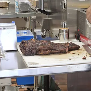 A slab of ribs waiting for customers.