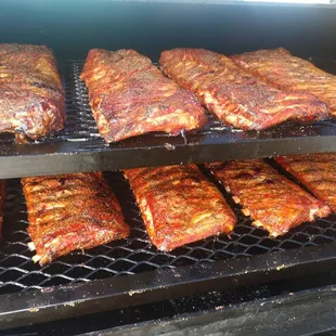 ribs cooking on the grill