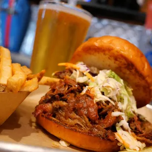 Pulled Pork Sandwich - served on a brioche bun topped with coleslaw