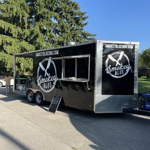 a food truck parked in a parking lot