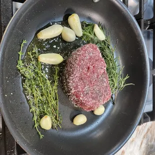 a steak in a frying pan