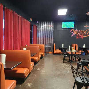 Dining area with tvs and a stage for entertainment