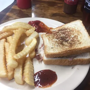 Pork sandwich and fries