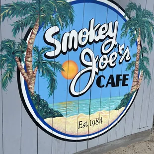a sign for smokey joe&apos;s cafe
