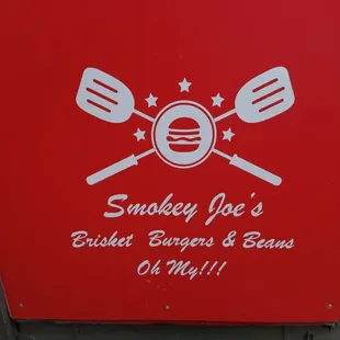 a sign for smokey joe's barbecue burgers and beans oh my