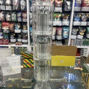 a glass bottle on a glass table
