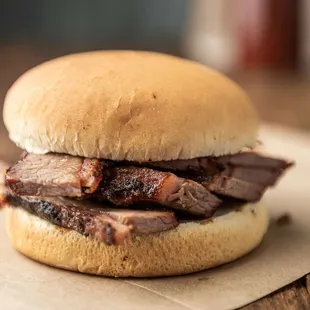 a beef sandwich on a bun